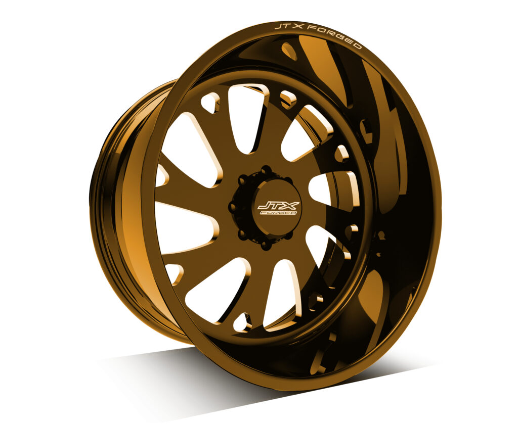 Gold JTX Forged wheel with multiple spokes.
