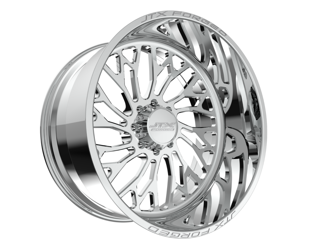 A shiny chrome car wheel rim with intricate spoke design.