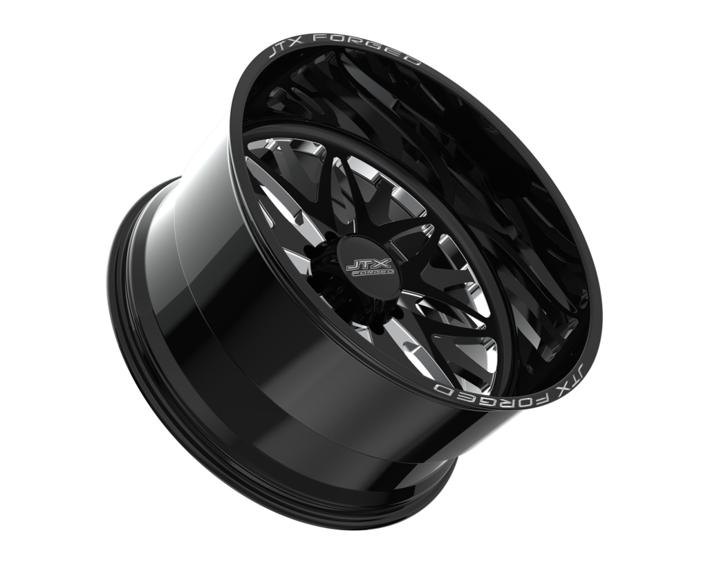 Black alloy wheel with intricate spoke design.
