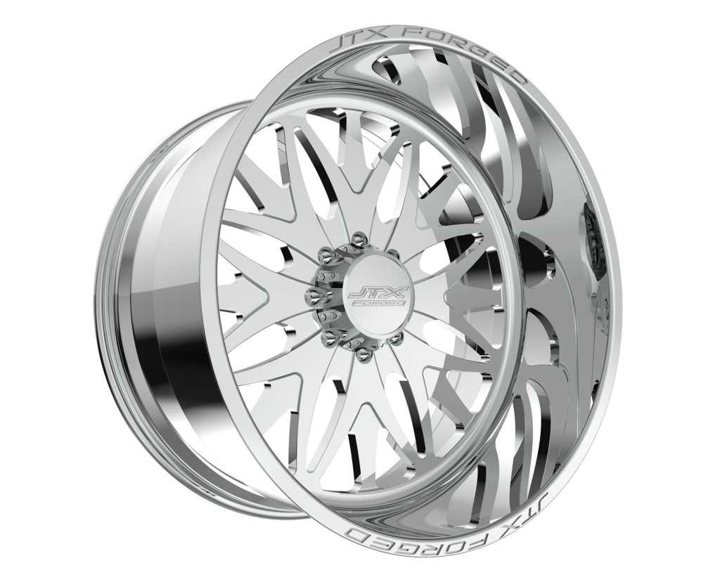 Chrome alloy wheel with intricate spoke design.