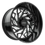 Black and silver wheel with geometric design.