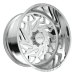 Chrome car wheel with intricate cutout design.