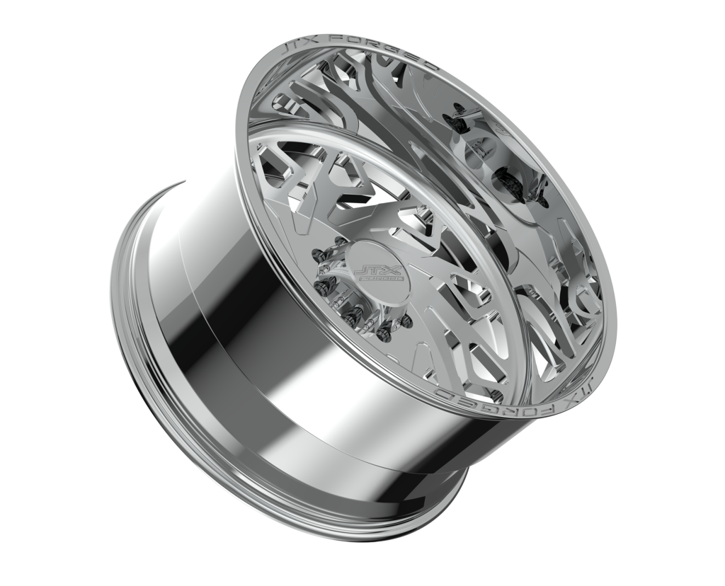 Chrome car wheel rim on black background.