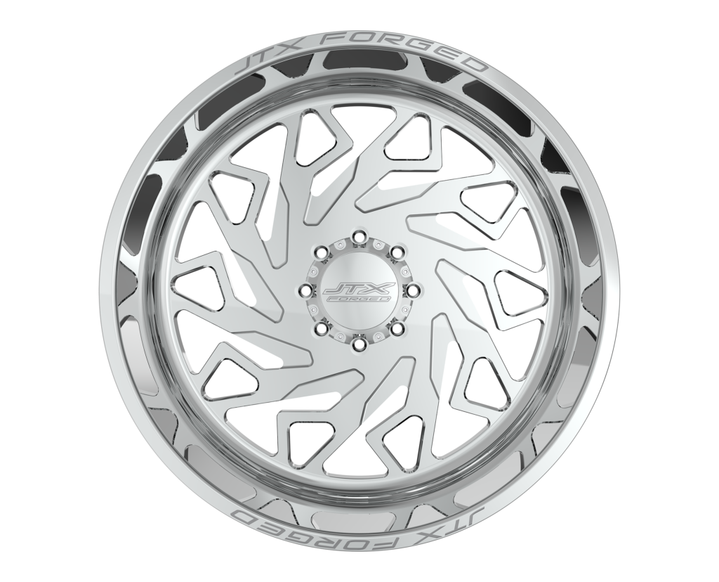 Silver alloy wheel with intricate design.