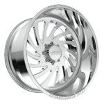 Chrome car wheel with intricate design.