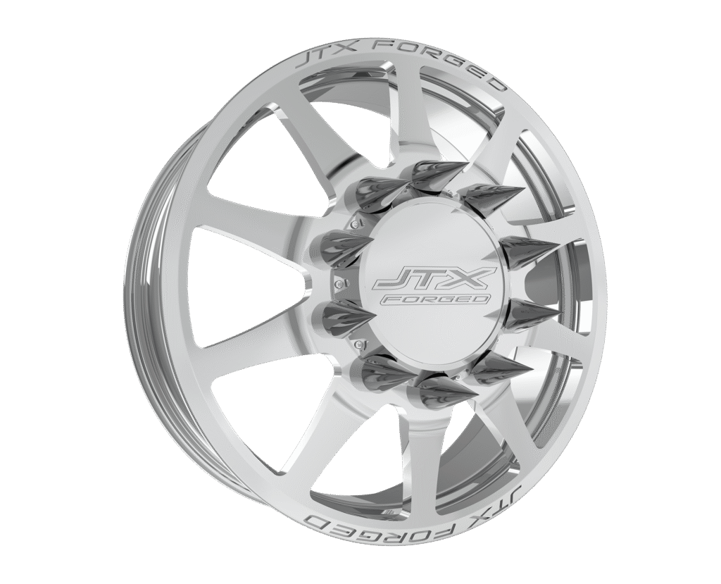 Chrome wheel with spiked design and logo.