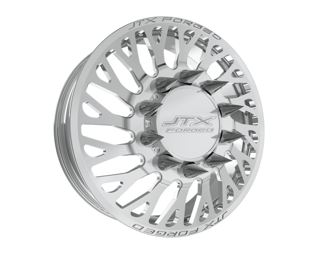 Chrome alloy wheel with intricate spoke design.
