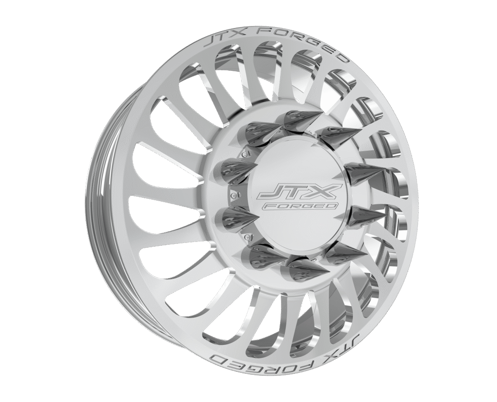 Chrome wheel rim with intricate spoke design.