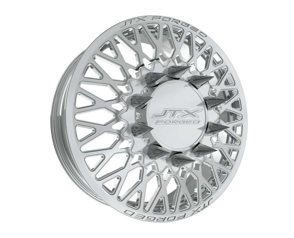 Silver alloy wheel with intricate spoke design.