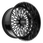 Black JTX Forged wheel with intricate design.