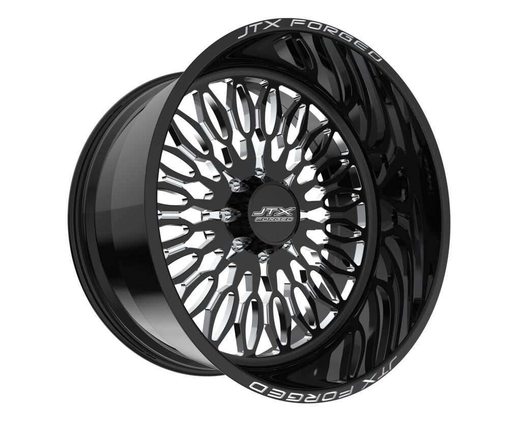 Black alloy wheel with intricate spoke design.