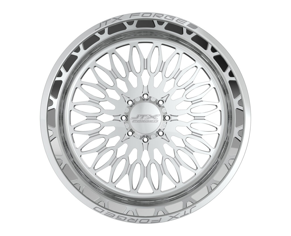 Silver alloy wheel with intricate spoke design.