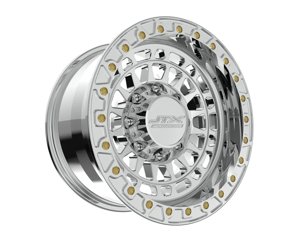 Chrome wheel rim with intricate design.