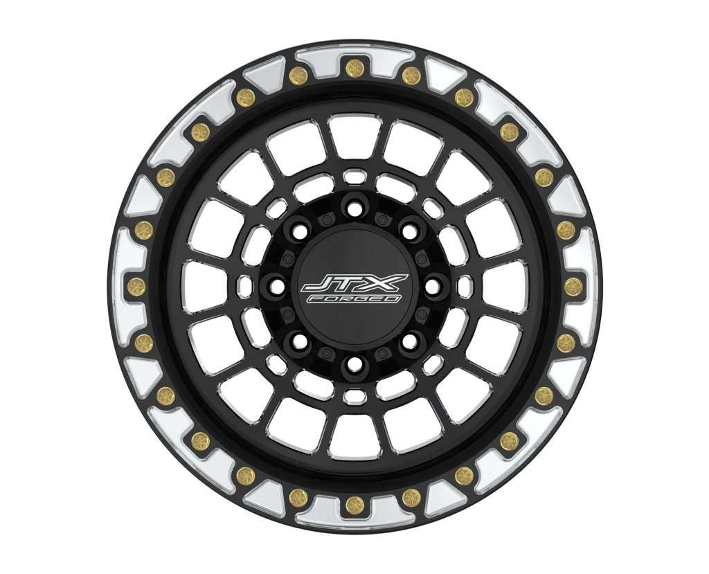 Black and silver car wheel with bolts.