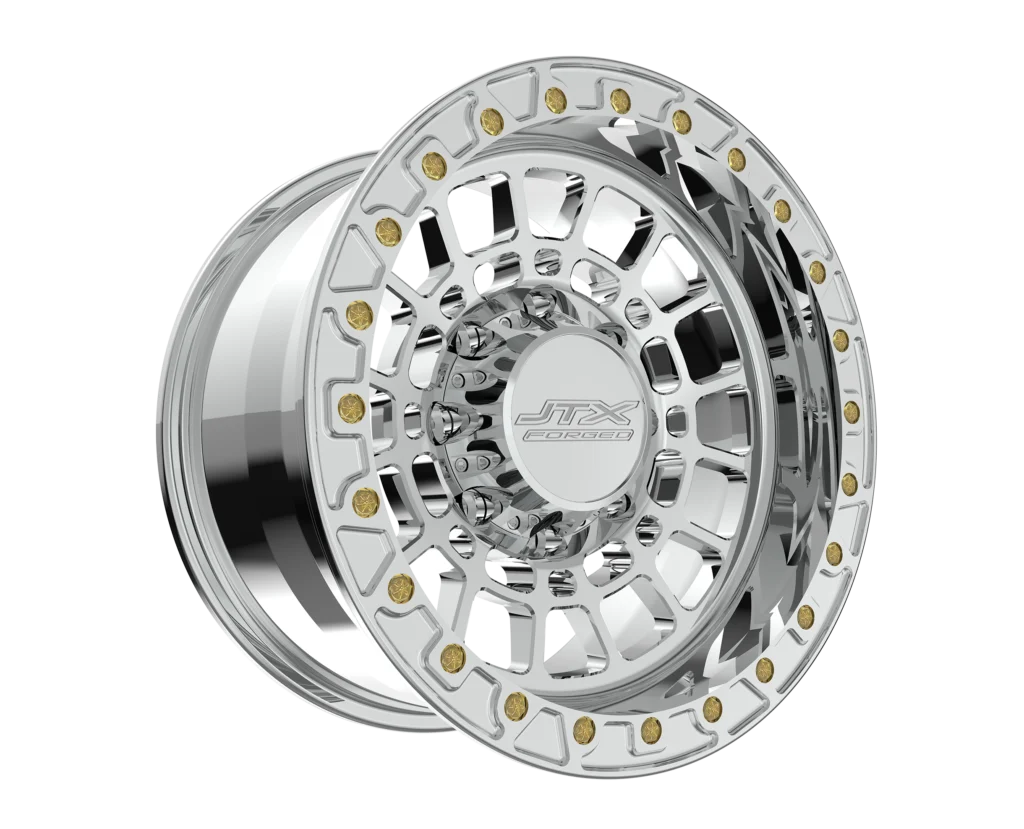 Chrome alloy wheel with gold accents.