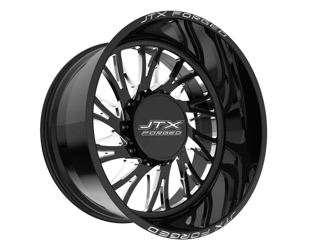 Black JTX Forged wheel with intricate design.