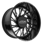 Black JTX Forged wheel with intricate design.