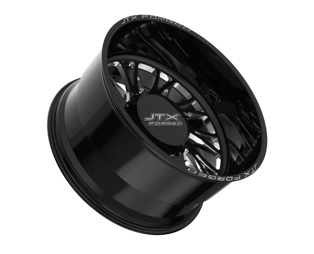 Black alloy wheel with intricate spoke design.