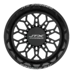 Black JTX Forged wheel with intricate design.