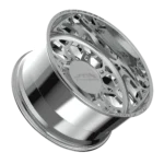 Chrome wheel rim with intricate design.