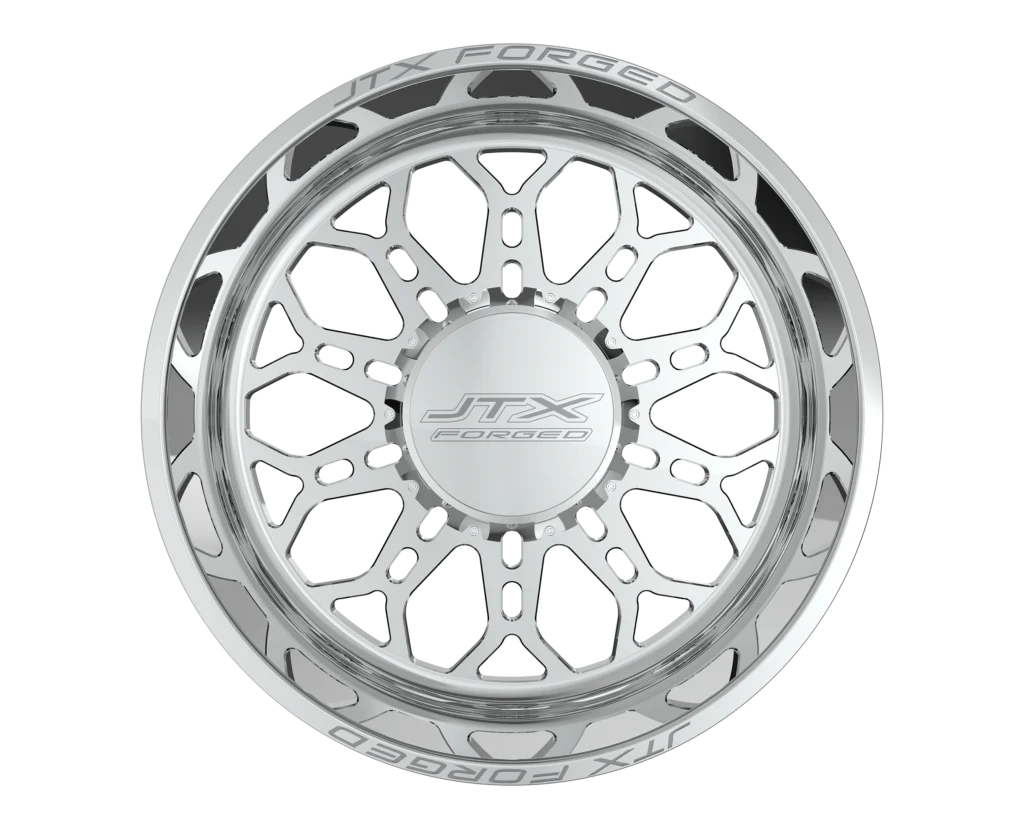 Silver alloy wheel with intricate design pattern.